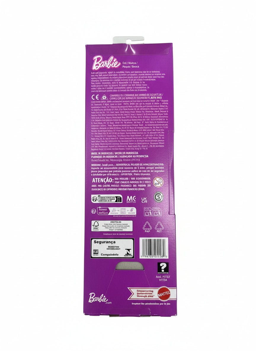 Barbie packaging with purple design on a gray surface