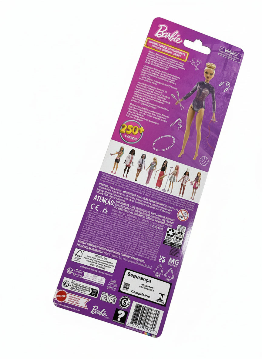 Barbie doll packaging on a chair with a gray background