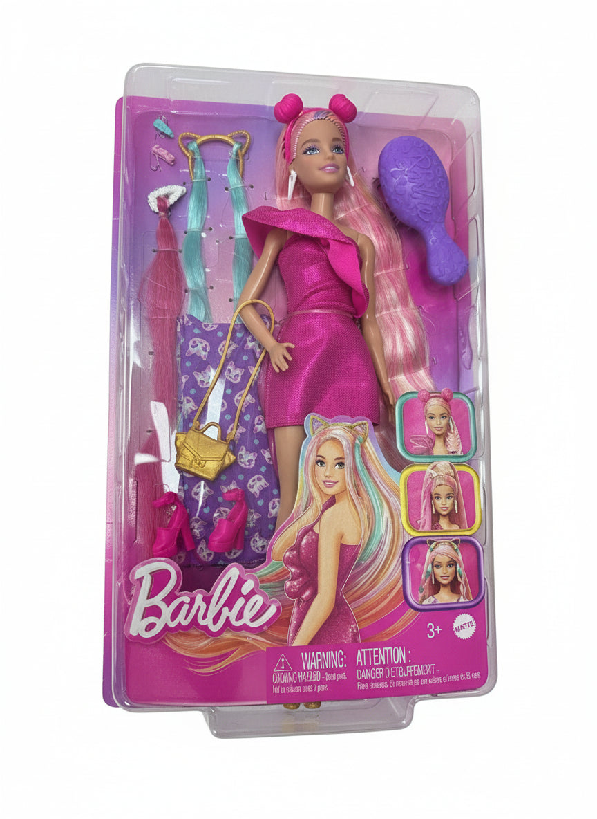 Barbie doll in pink dress with accessories on a gray surface