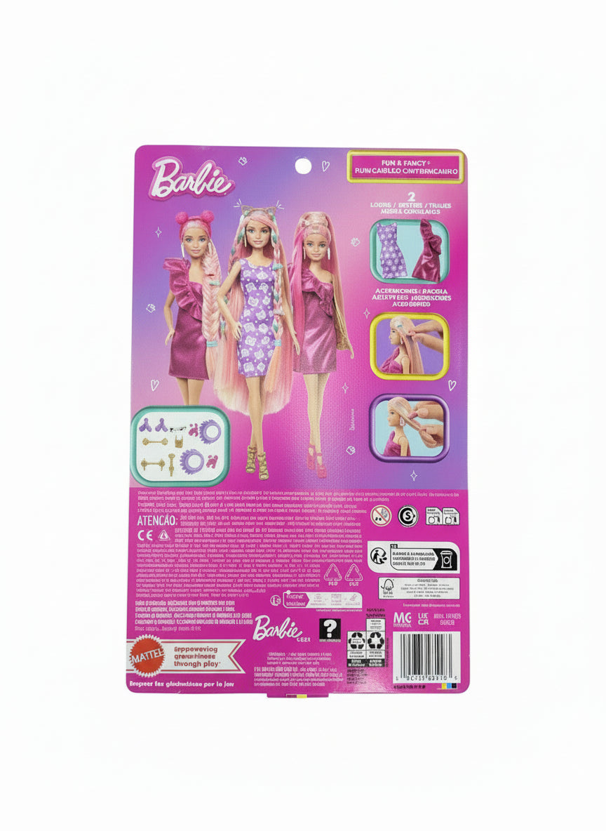 Barbie doll packaging with two dolls on a gray surface