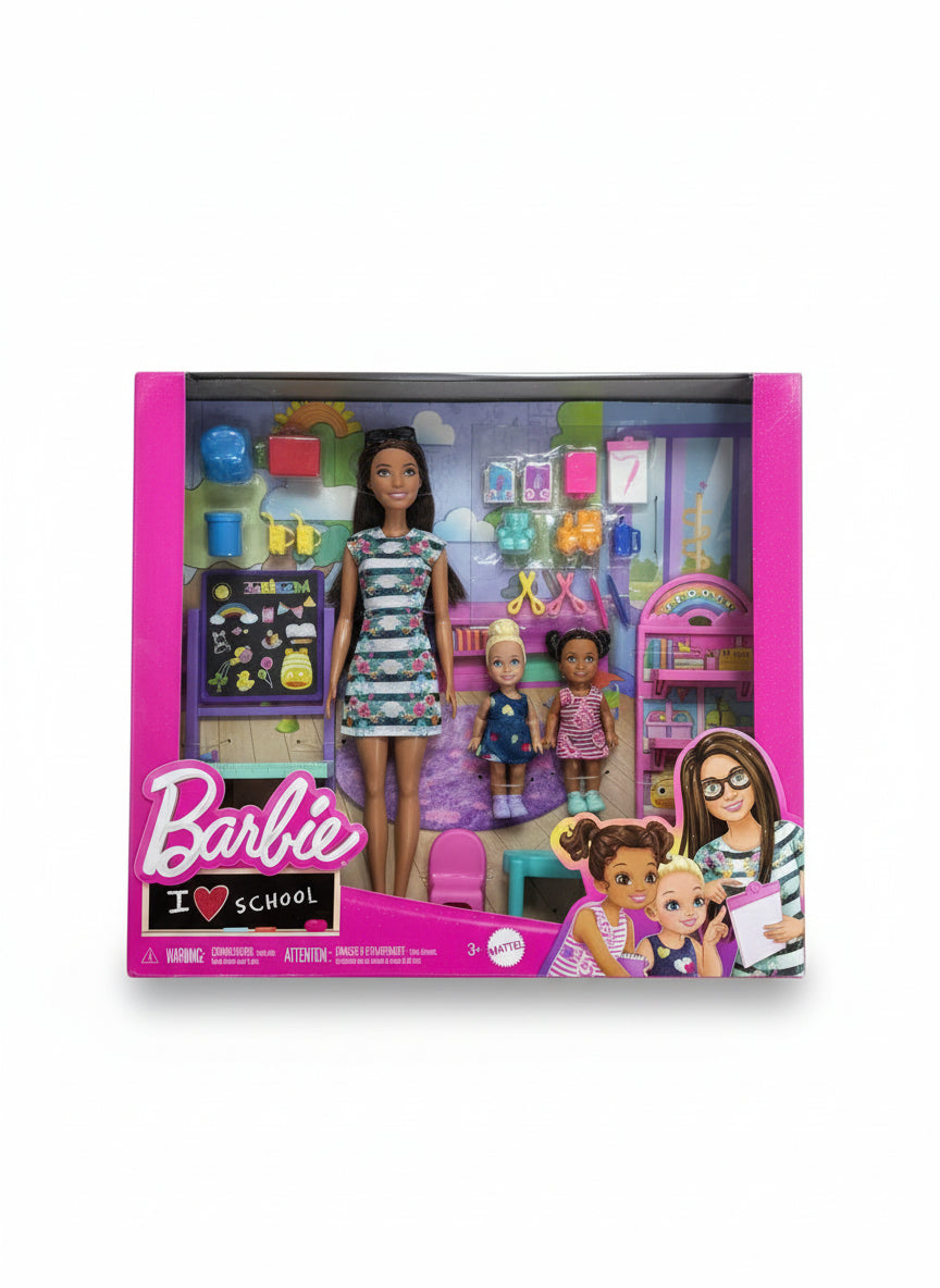 Barbie classroom playset packaging on a wooden floor