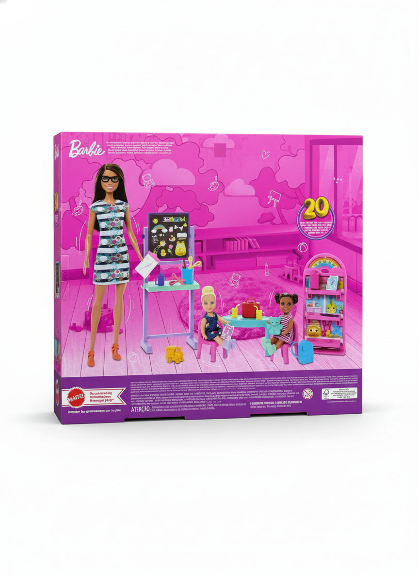 Barbie doll playset packaging on a wooden floor