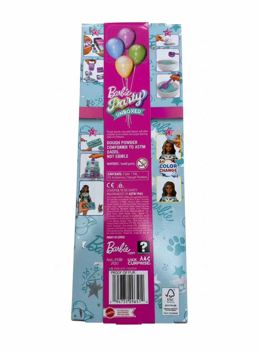 Barbie party supplies packaging on a wooden floor