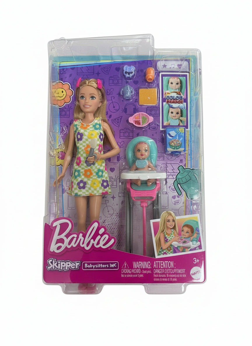 Barbie Skipper Babysitter doll in packaging on a wooden floor